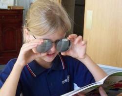 girl testing glasses